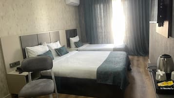 Classic Double Room, Balcony | In-room safe, desk, laptop workspace, iron/ironing board (on request)