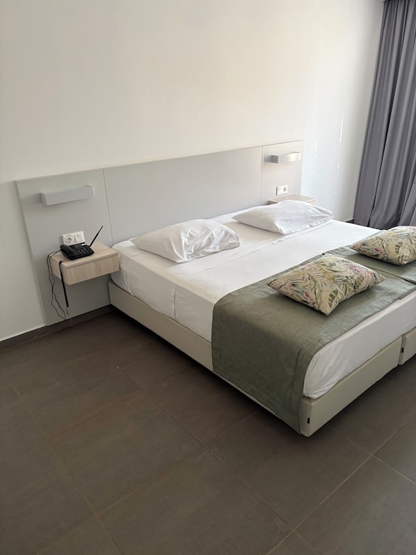 Habitación doble Confort | Camas extra, wifi gratis y ropa de cama