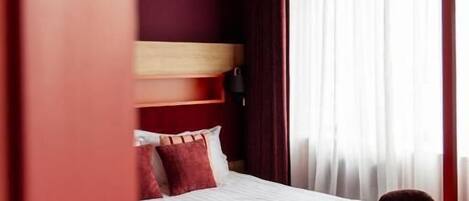 Deluxe Double Room | Minibar, in-room safe, blackout drapes, soundproofing