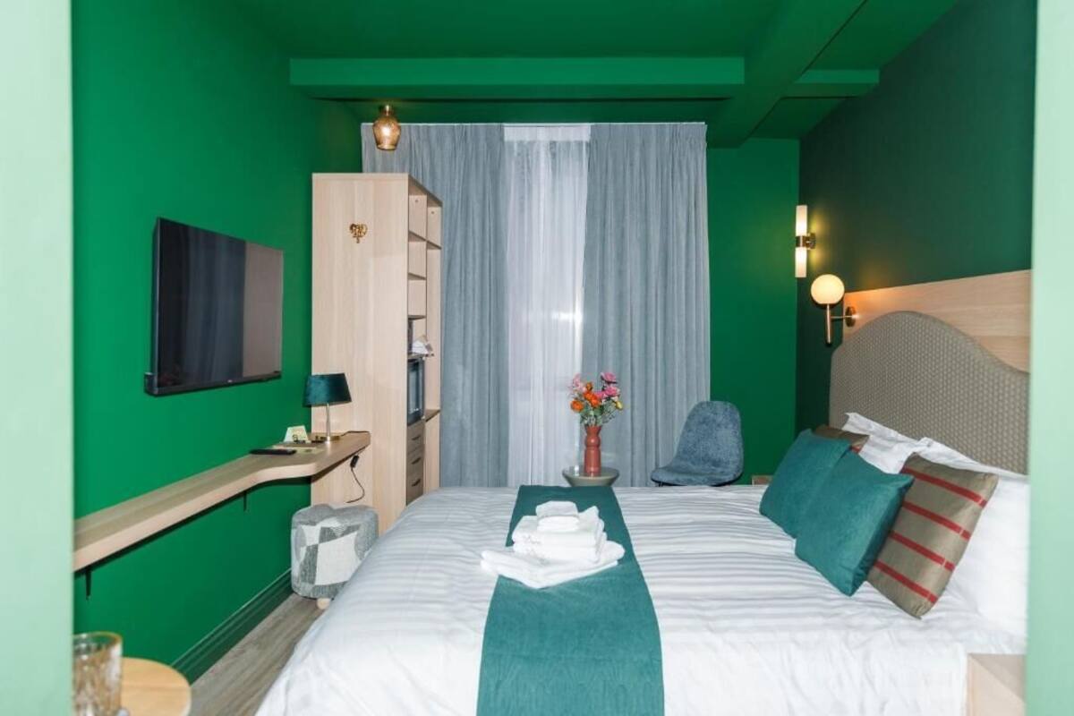 Doppelzimmer, Parkblick | Zimmersafe, Verdunkelungsvorhänge, schallisolierte Zimmer