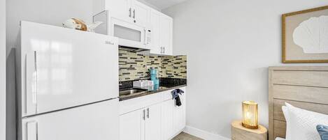 Coffee/tea maker, fridge, microwave, toaster