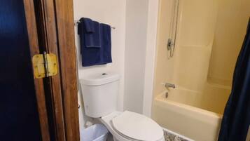 Hair dryer, towels, soap, toilet paper