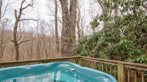 A hot tub on a wooden deck surrounded by trees. - Appalachian Retreat (Blowing Rock)