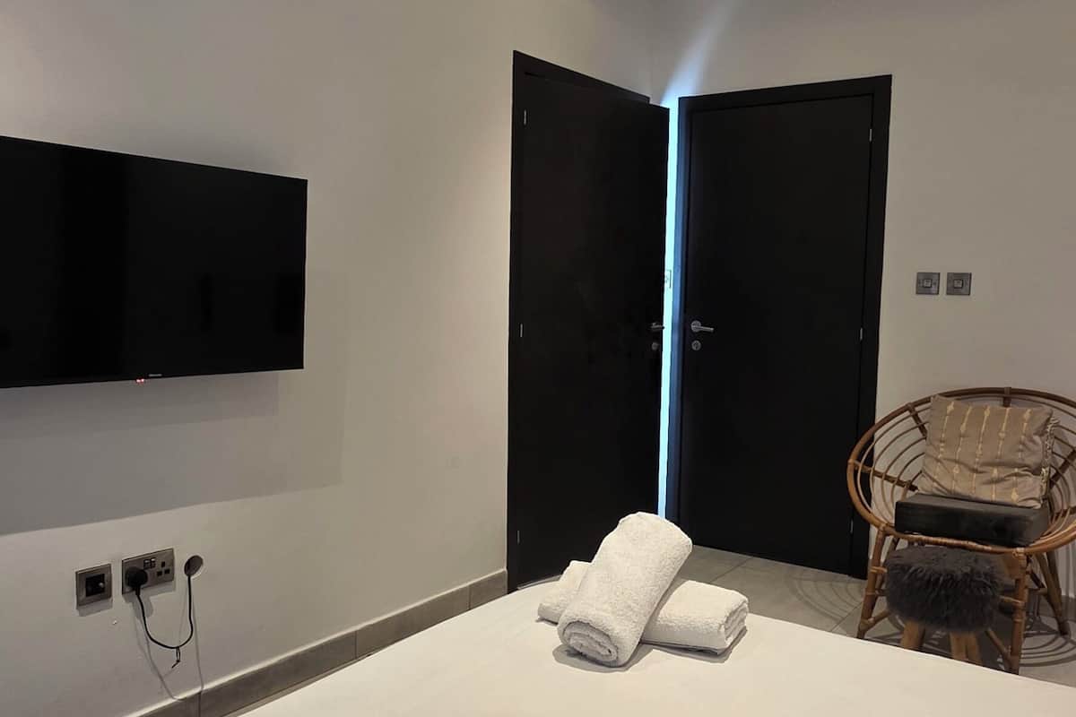 Habitación ejecutiva | Tabla de planchar con plancha y wifi gratis