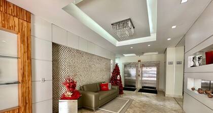 Apartment with a view of the beach, next to Luiz Bassani square.
