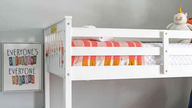 A bunk bed with a colorful quilt and a plush toy on top. - 3BR Home with Private Pool Minutes from Disney (Kissimmee)