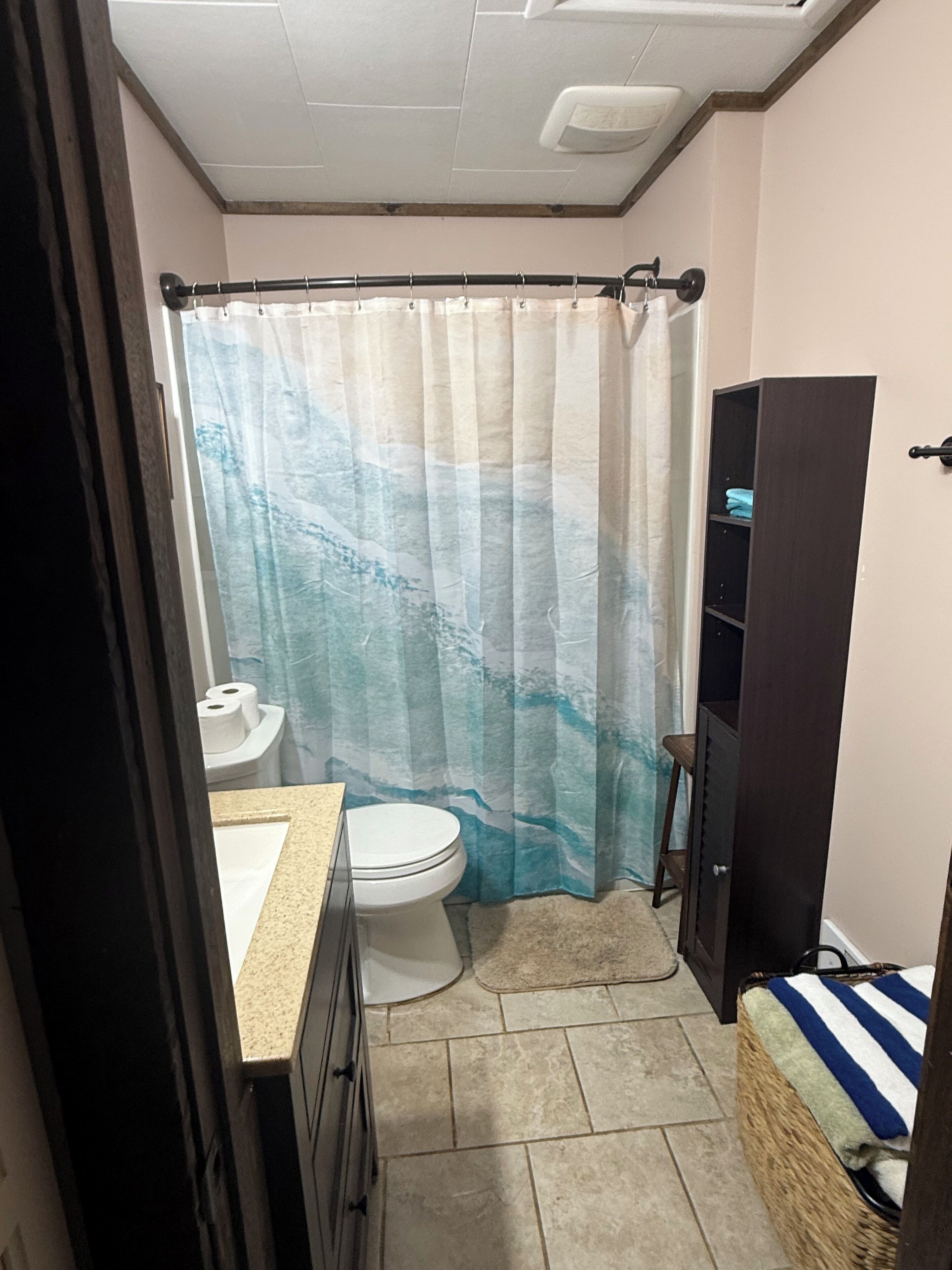 Hair dryer, towels, soap, toilet paper