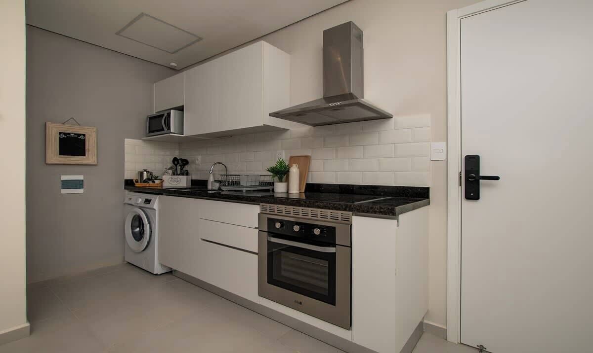 Coffee/tea maker, fridge, microwave, oven