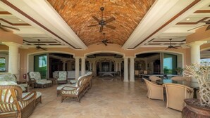 A spacious indoor area with a high ceiling, multiple seating arrangements, and a pool table. - Casa Garmus - 10 bdr Ocean View (Playa Herradura)