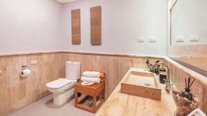 A bathroom with a toilet, sink, and mirror. - Studio 3 guests Balcony with views Fishing lodge 1090 (Punta Cana)