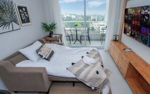 Iron/ironing board, WiFi, bed sheets - Sleek 1BR Apt, City Views & Pool (Asunción)