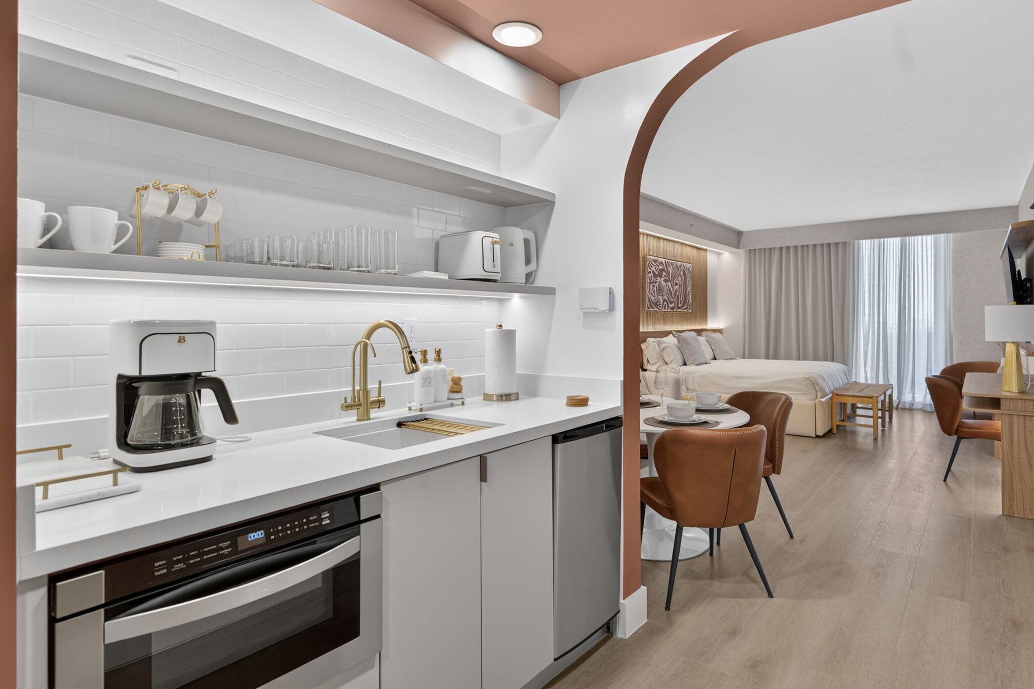 Coffee/tea maker, fridge, microwave, oven