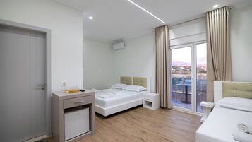 Triple Room, Balcony | Free WiFi, bed sheets