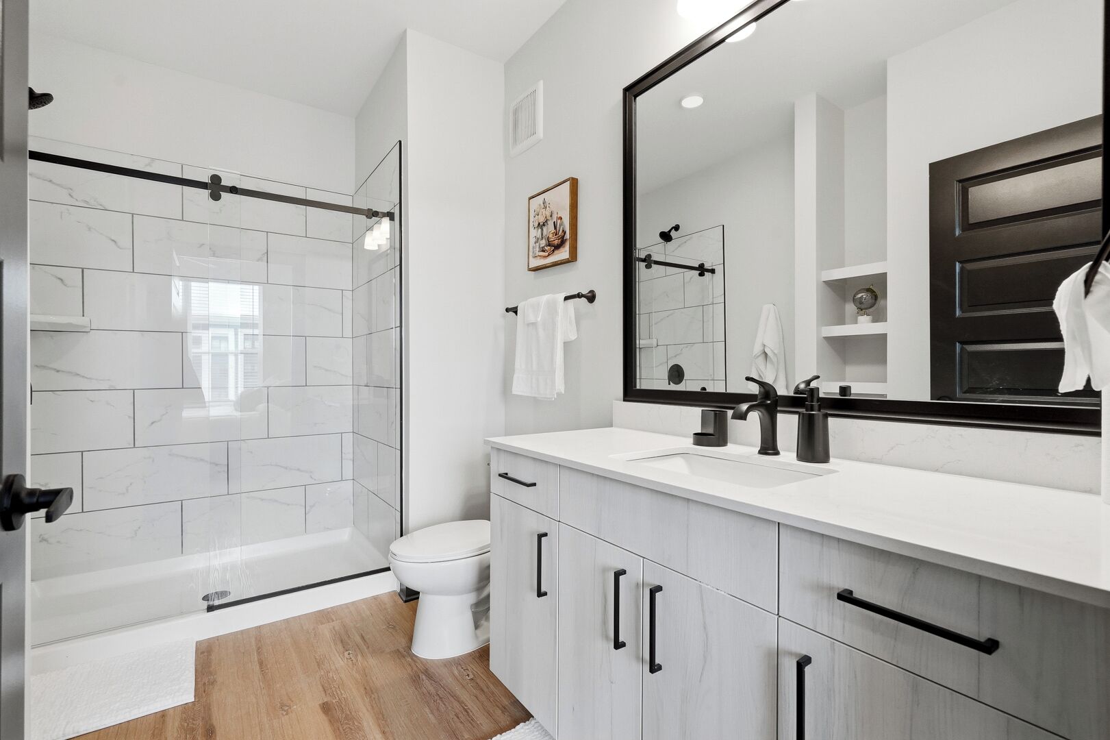 Shower, towels, soap, toilet paper