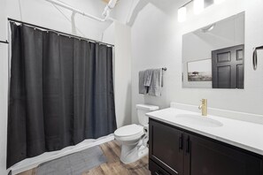 Shower, hair dryer, towels - Downtown Fargo Brick Loft · 1BR/1BA · Steps to Dining, Near NDSU (Fargo)