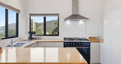 Coastal 2BR Escape, Steps to Beach, Dining and Bar