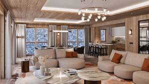 A modern living room with a sectional sofa, a coffee table, and a dining area with a bar. - Ski-in/ski-out apartment at Rond-Point des Pistes (Méribel)