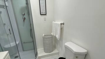 Shower, towels, soap, shampoo