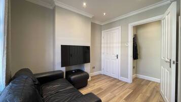 House, 2 Bedrooms | Living room | Books