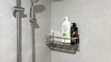 Shower, hair dryer, towels, soap