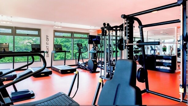 A gym with treadmills, elliptical machines, and weightlifting equipment. - Hotel Mousai Puerto Vallarta-Studio Suite W/ Private hot tub, Oceanview & Butler (Puerto Vallarta)