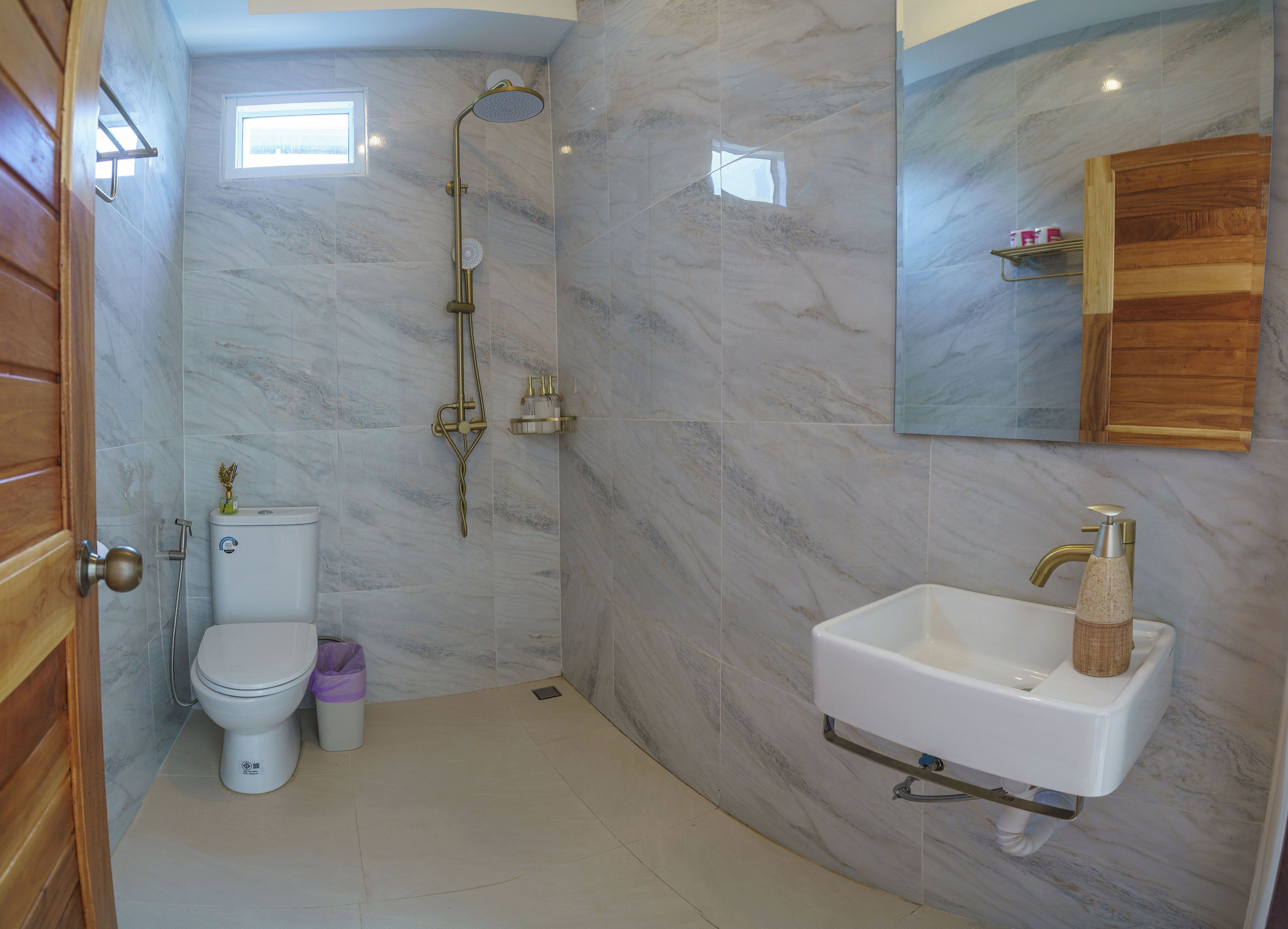 Double Room, Patio | Bathroom | Shower, slippers, towels, soap