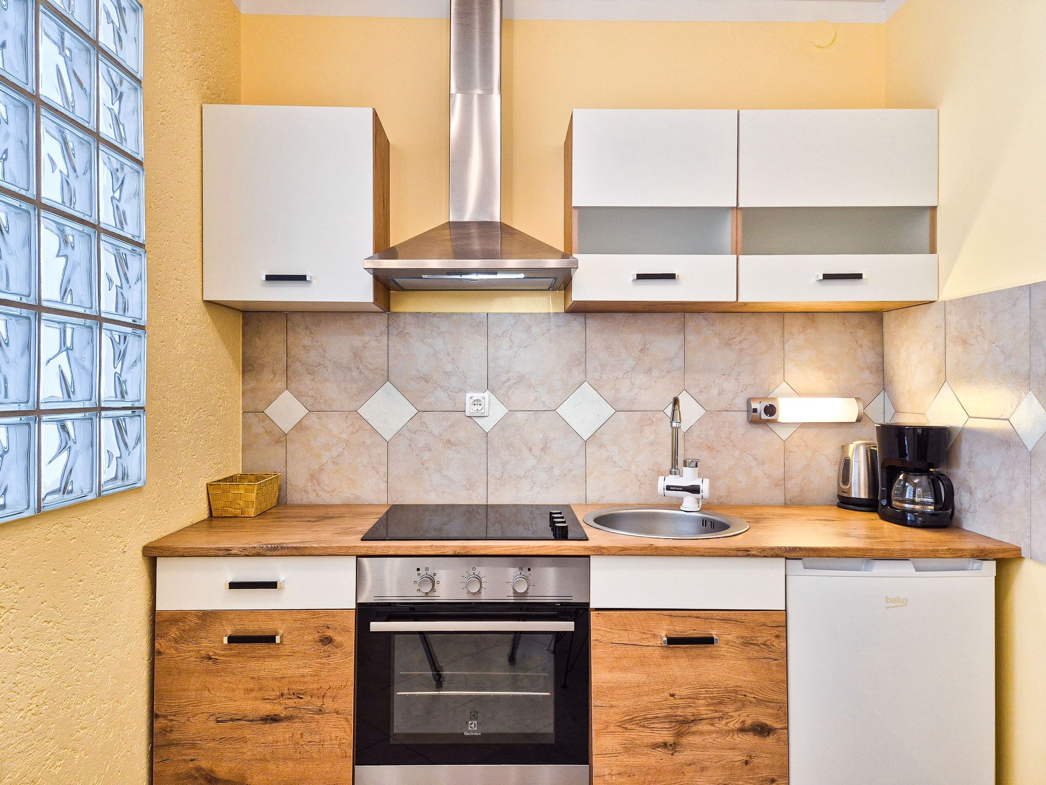 Fridge, oven, cookware/dishes/utensils