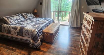 Upper Main Cabin is a 4-bedroom cabin in tranquil Loon Lake