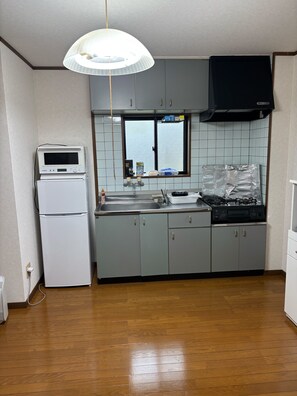 Basic Apartment, Garden View | Private kitchen | Fridge, microwave, stovetop, cookware/dishes/utensils - Resort Apartment Nango (Nichinan)