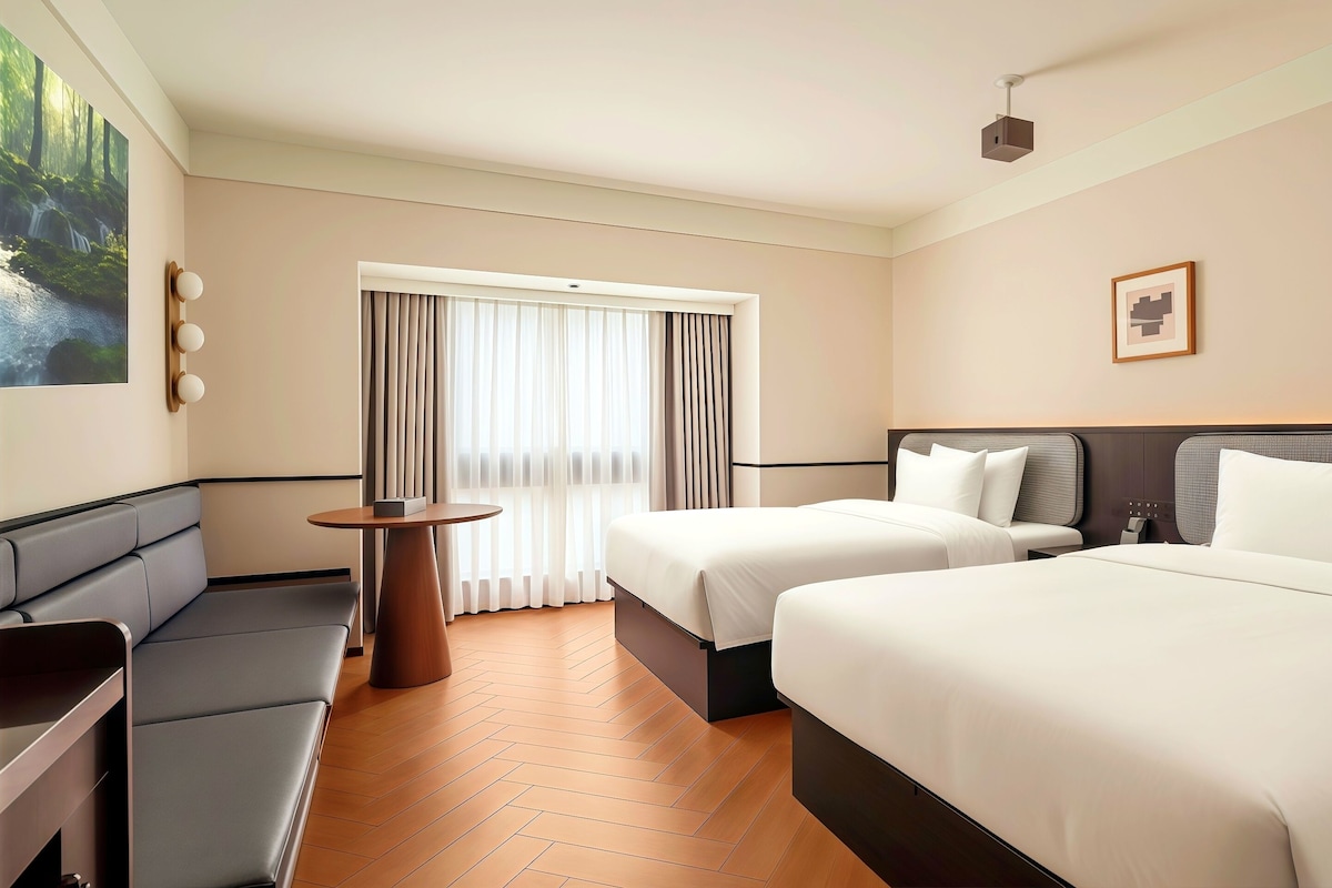 Habitación Deluxe con 2 camas individuales | Sábanas de algodón egipcio, ropa de cama de alta calidad y edredón