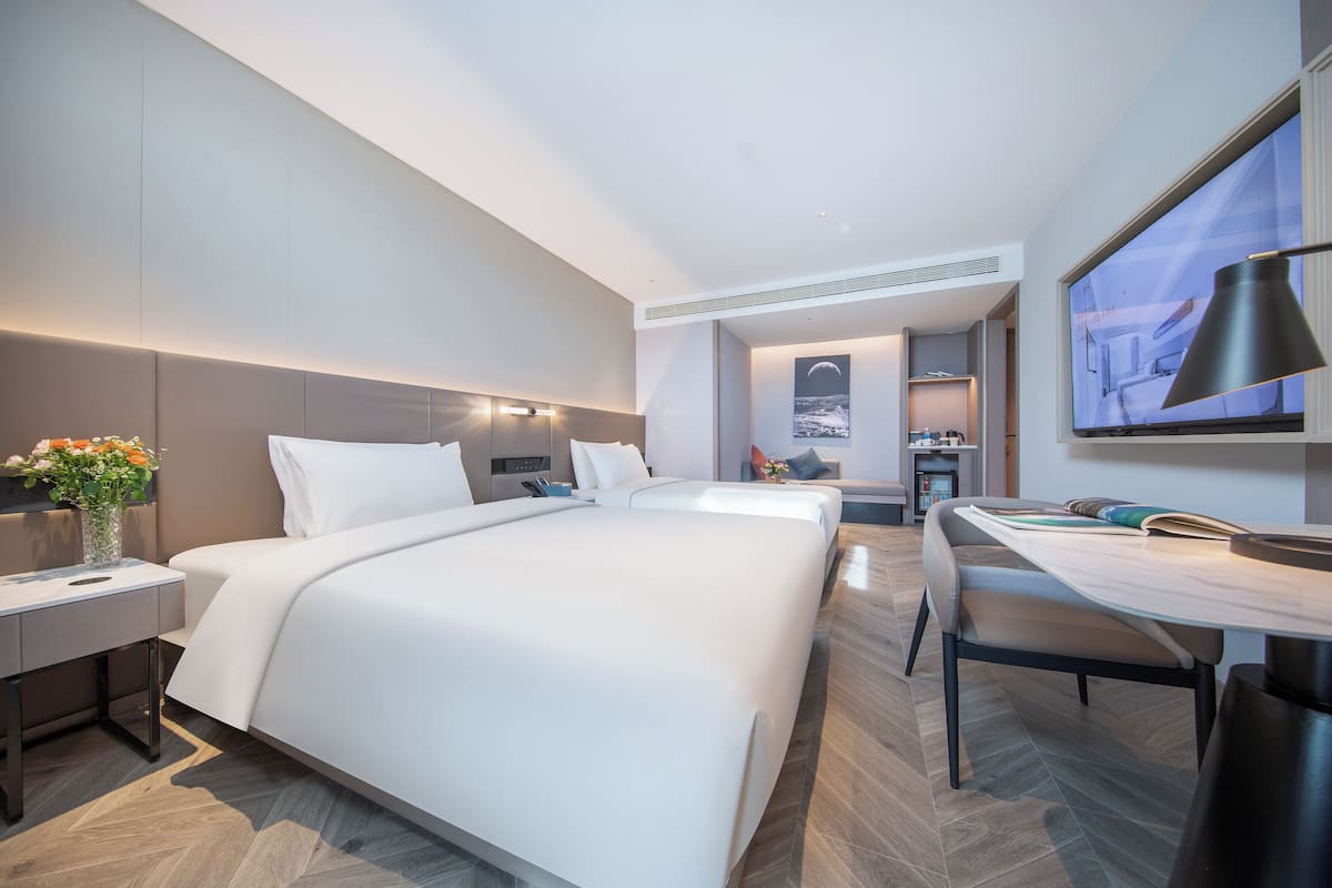 Habitación triple Deluxe | Escritorio, cortinas blackout y wifi gratis