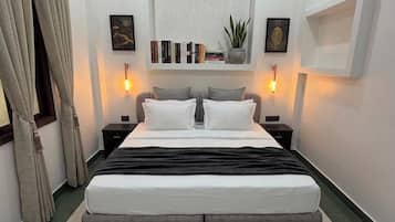 Apartamento premium, 2 quartos | Escrivaninha, espaço de trabalho para notebook, Wi-Fi de cortesia