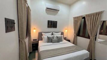 Apartamento premium, 2 quartos | Escrivaninha, espaço de trabalho para notebook, Wi-Fi de cortesia
