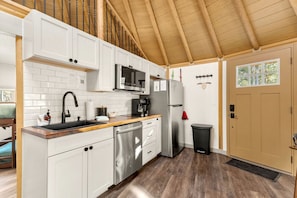 Private kitchen - Rustic Western Cabin with Loft & Hot Tub Located Near Canyon Lake, Texas (Canyon Lake)