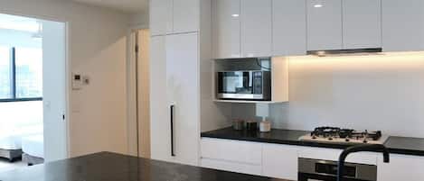 Coffee/tea maker, fridge, microwave, oven