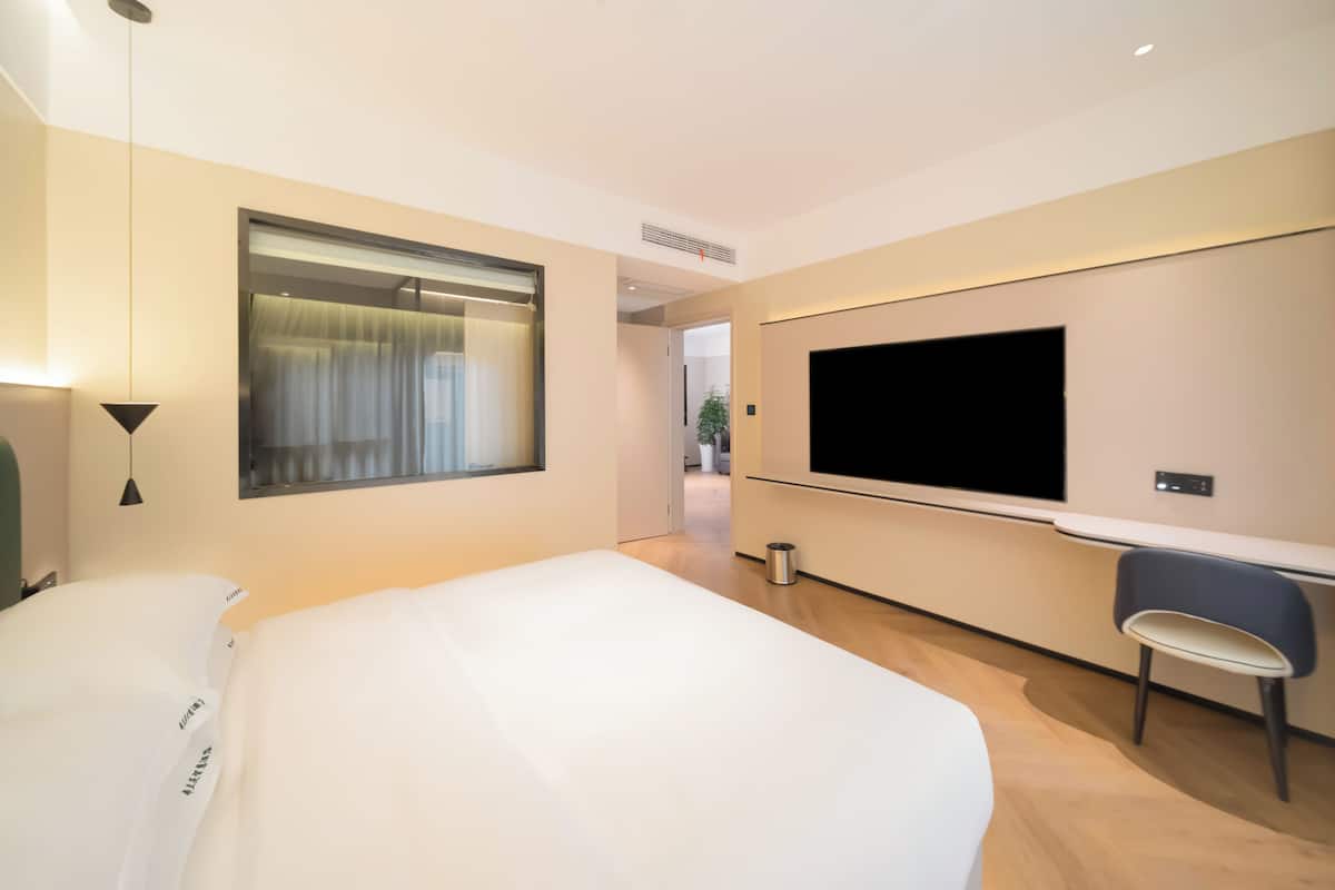 Family Suite, City View | Premium bedding, down comforters, pillowtop beds, desk