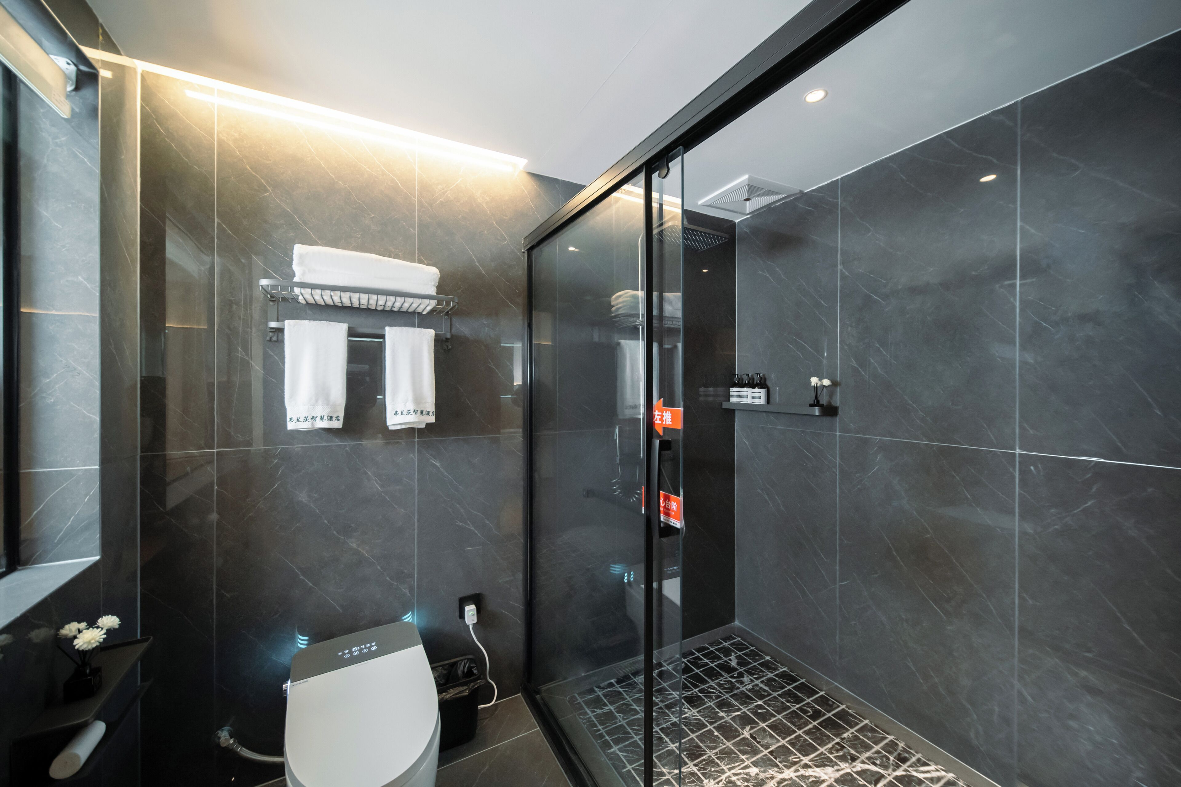 Shower, rainfall showerhead, free toiletries, hair dryer