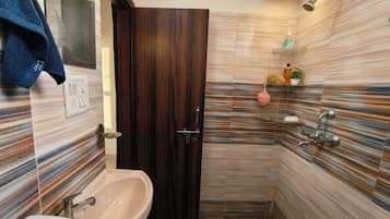 Shower, eco-friendly toiletries, hair dryer, towels