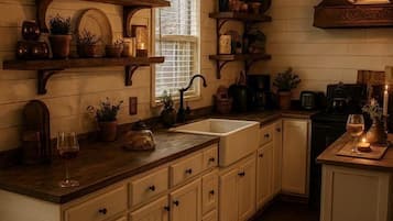 Coffee/tea maker, fridge, oven, stovetop