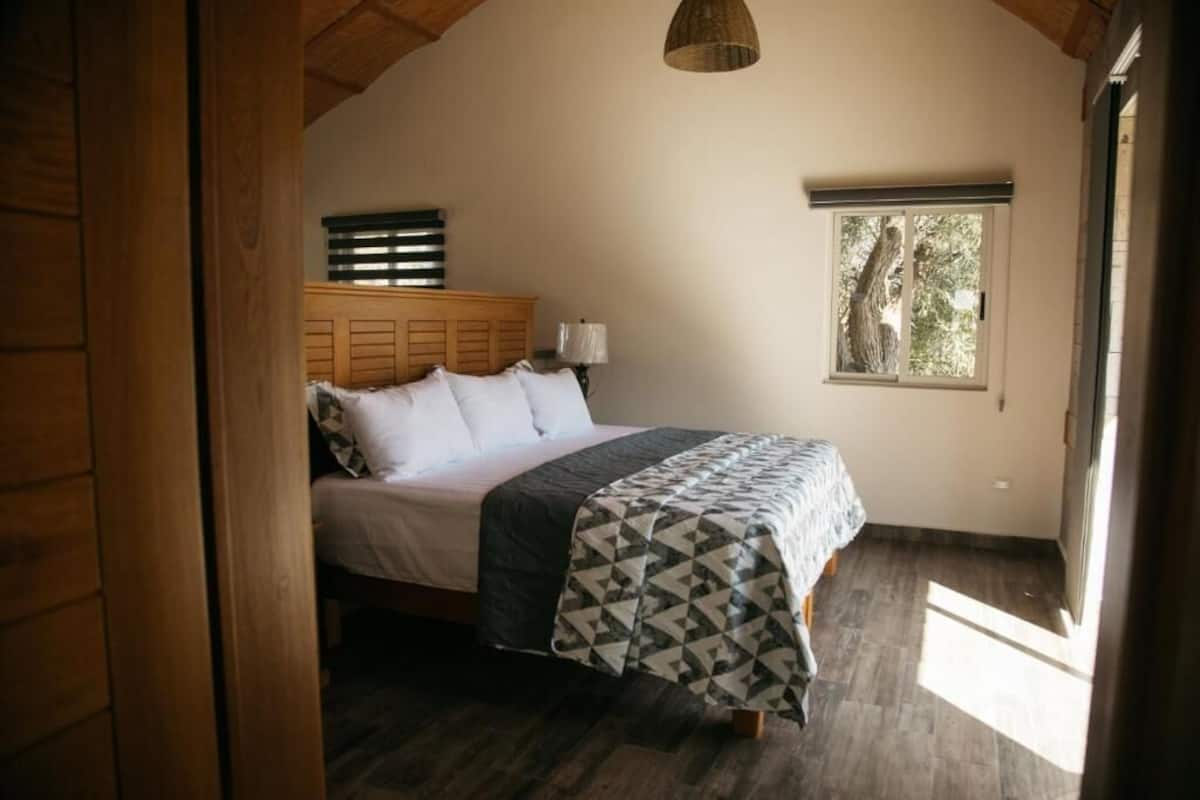 Suite, Balcony, Garden View | In-room safe, iron/ironing board, WiFi (free)