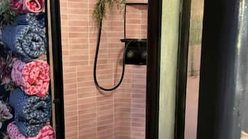 Hair dryer, towels, soap, shampoo