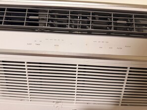An air conditioning unit with control buttons for various settings. - Spacious 3-bedroom apartment with AC near Portland (Gresham)