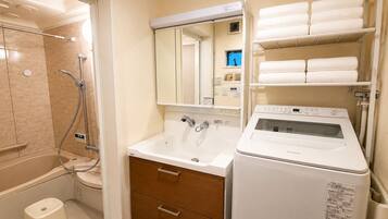 Hair dryer, bidet, towels, soap