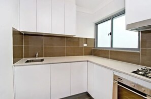 Private kitchen - Bright 1-Bedroom Apartment Steps from Bondi Beach (Bondi Beach)