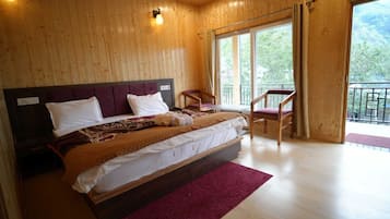 Habitación Deluxe | Camas supletorias y ropa de cama