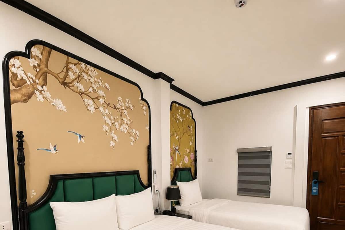 Habitación triple ejecutiva | Wifi gratis y ropa de cama