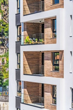 A multi-story building with balconies, large windows, and a modern architectural design. - All you need Apartment City Center by Interhome (Funchal (Madeira))