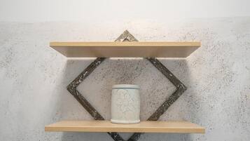 A shelf with a decorative item.