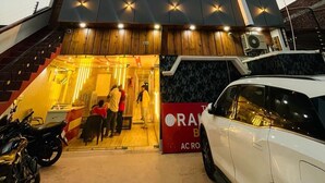 A hotel entrance with a sign reading 'Shri Ji Palace' and a 24x7 service indication. - Roomshala Shreeji Palace  (Ayodhya)