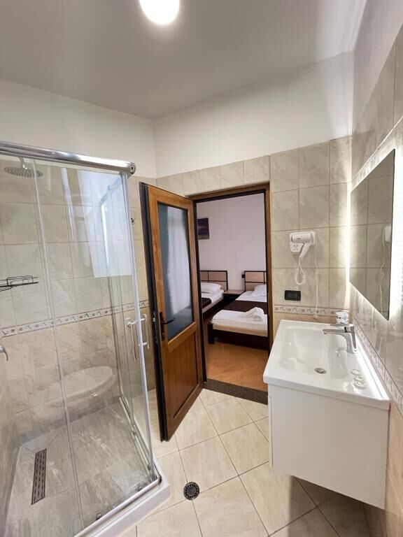Standard Triple Room, Balcony, Lagoon View | Bathroom | Shower, hair dryer, towels, soap